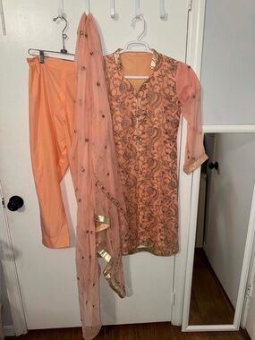 Peach-colored Pakistani formal salwar kameez set